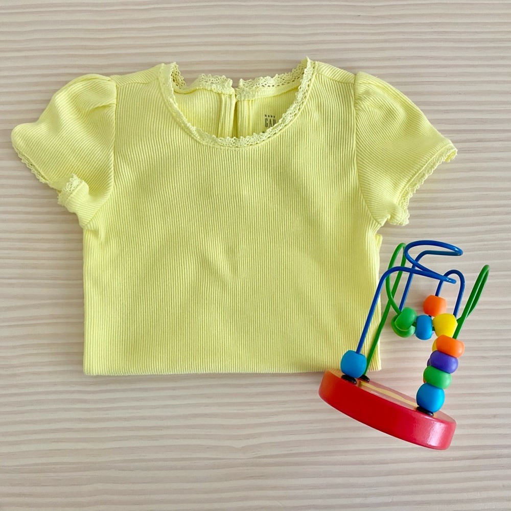 Free with bundle of 5 or more Gap Ribbed Onesie + Travel Toy